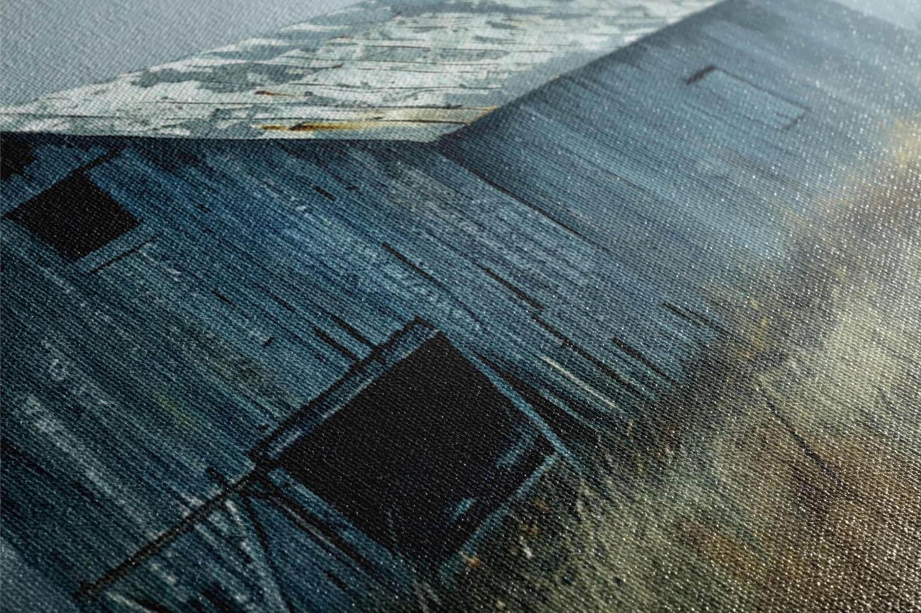The image is a close-up of a weathered wooden structure, possibly a barn or shed, with a textured, aged appearance.