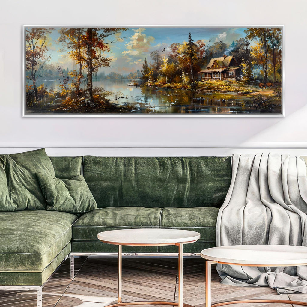 a living room with a green couch and a painting on the wall