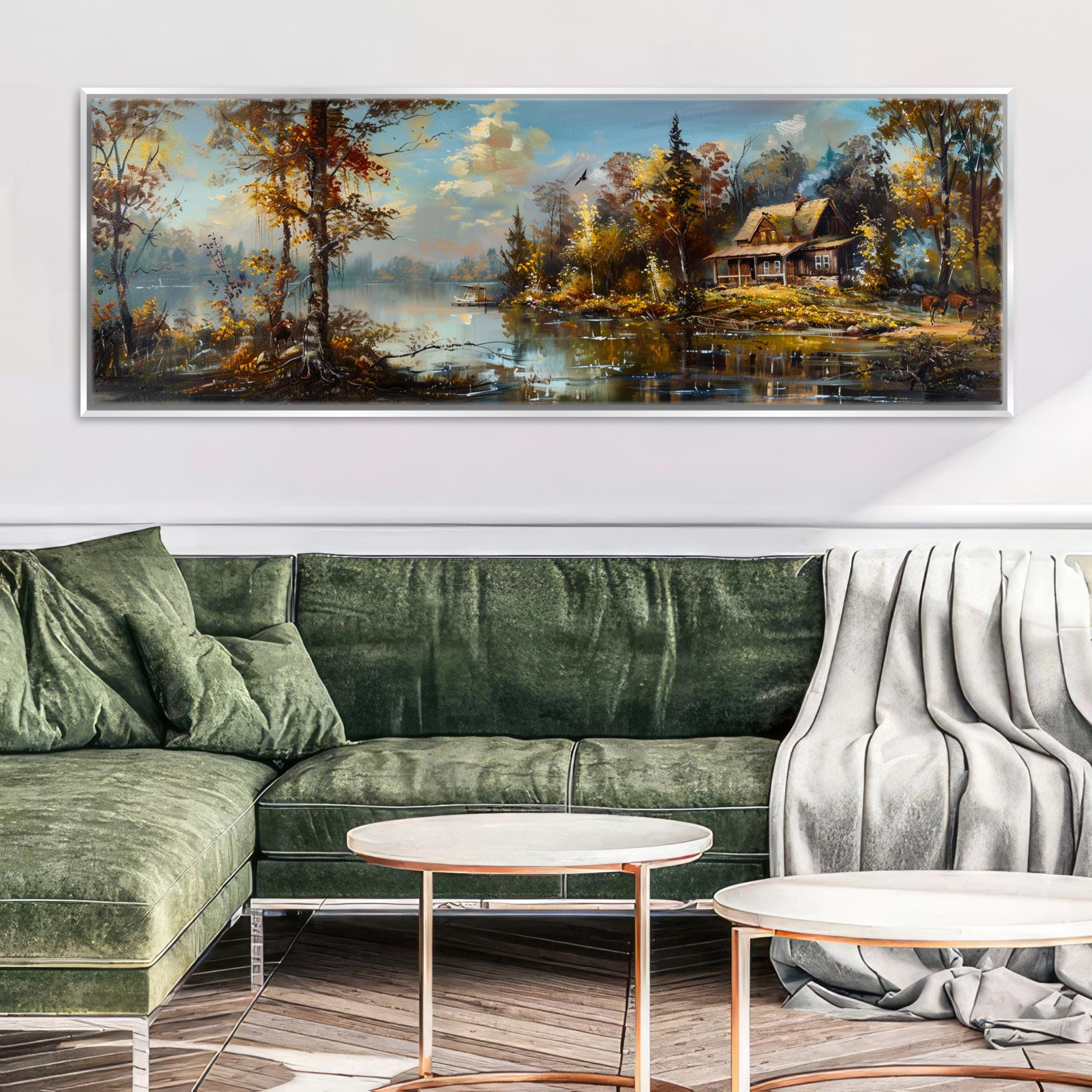 a living room with a green couch and a painting on the wall