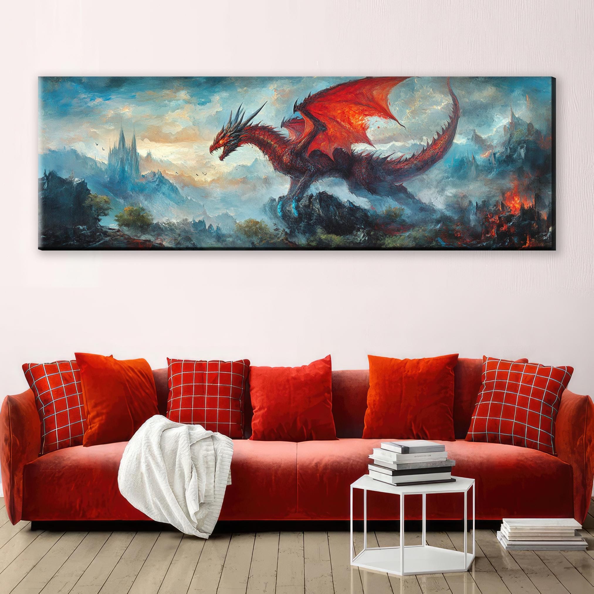 a living room with a red couch and a painting on the wall