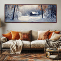 a living room with a couch and a painting on the wall