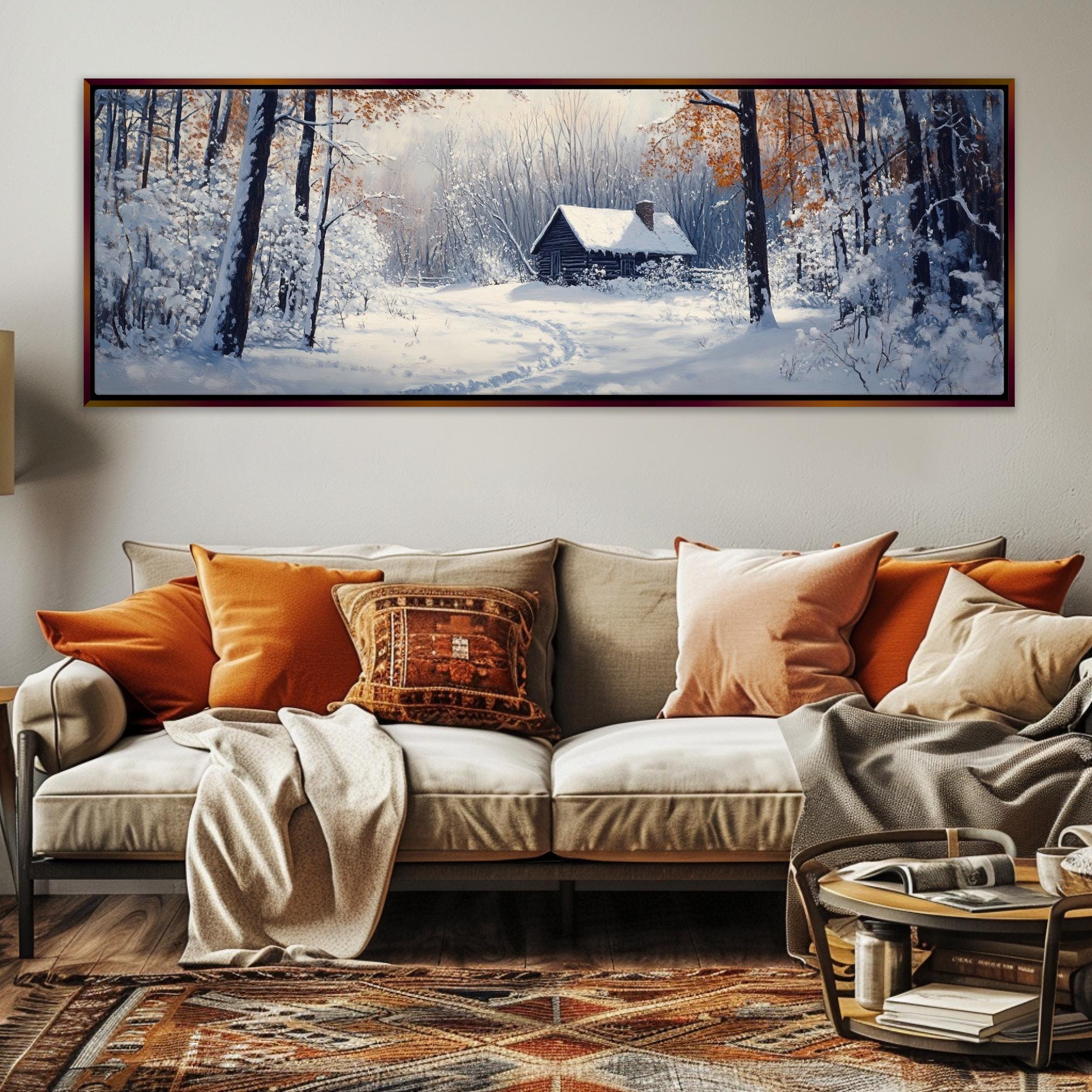 a living room with a couch and a painting on the wall