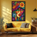a living room with a couch and a painting on the wall