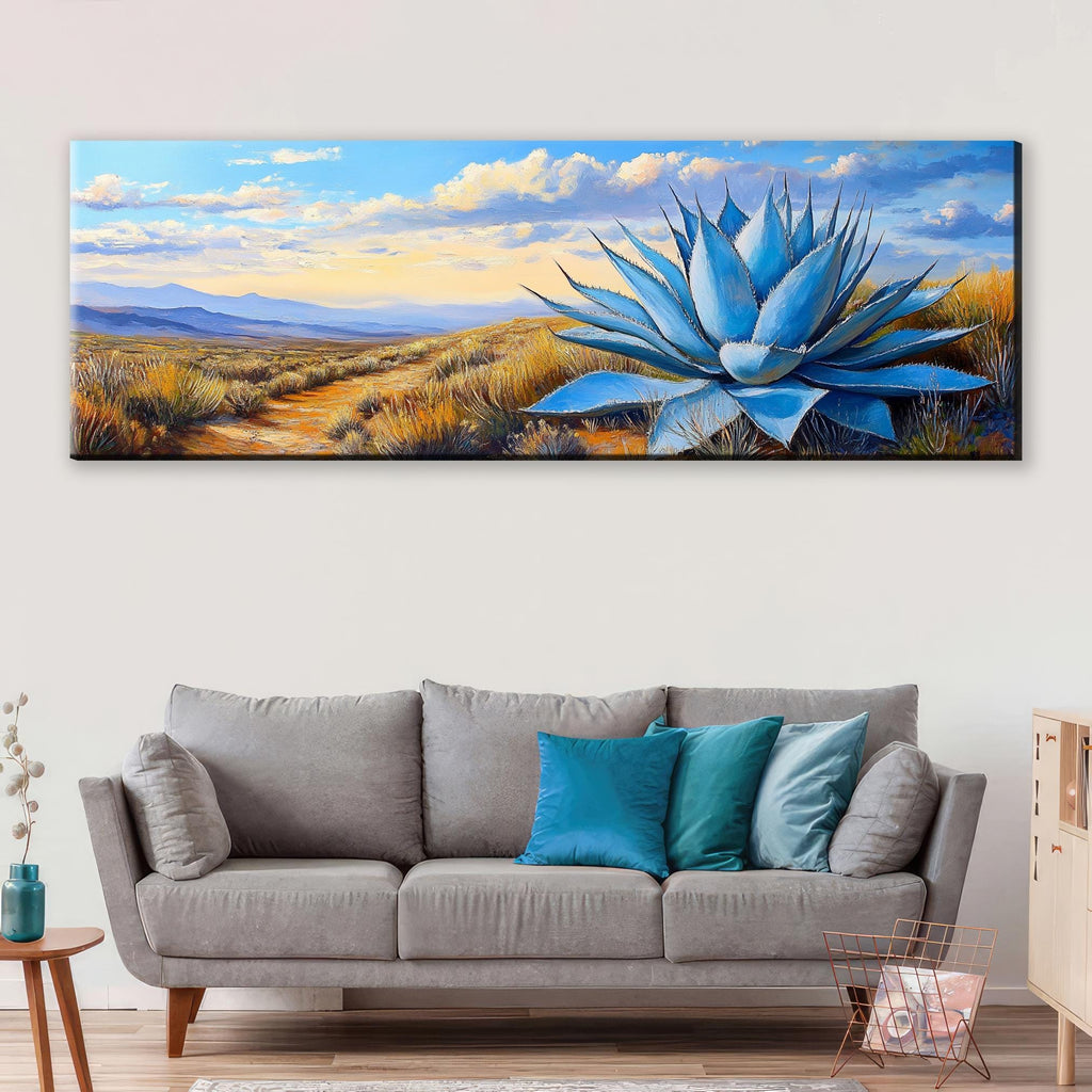 a living room with a couch and a painting on the wall