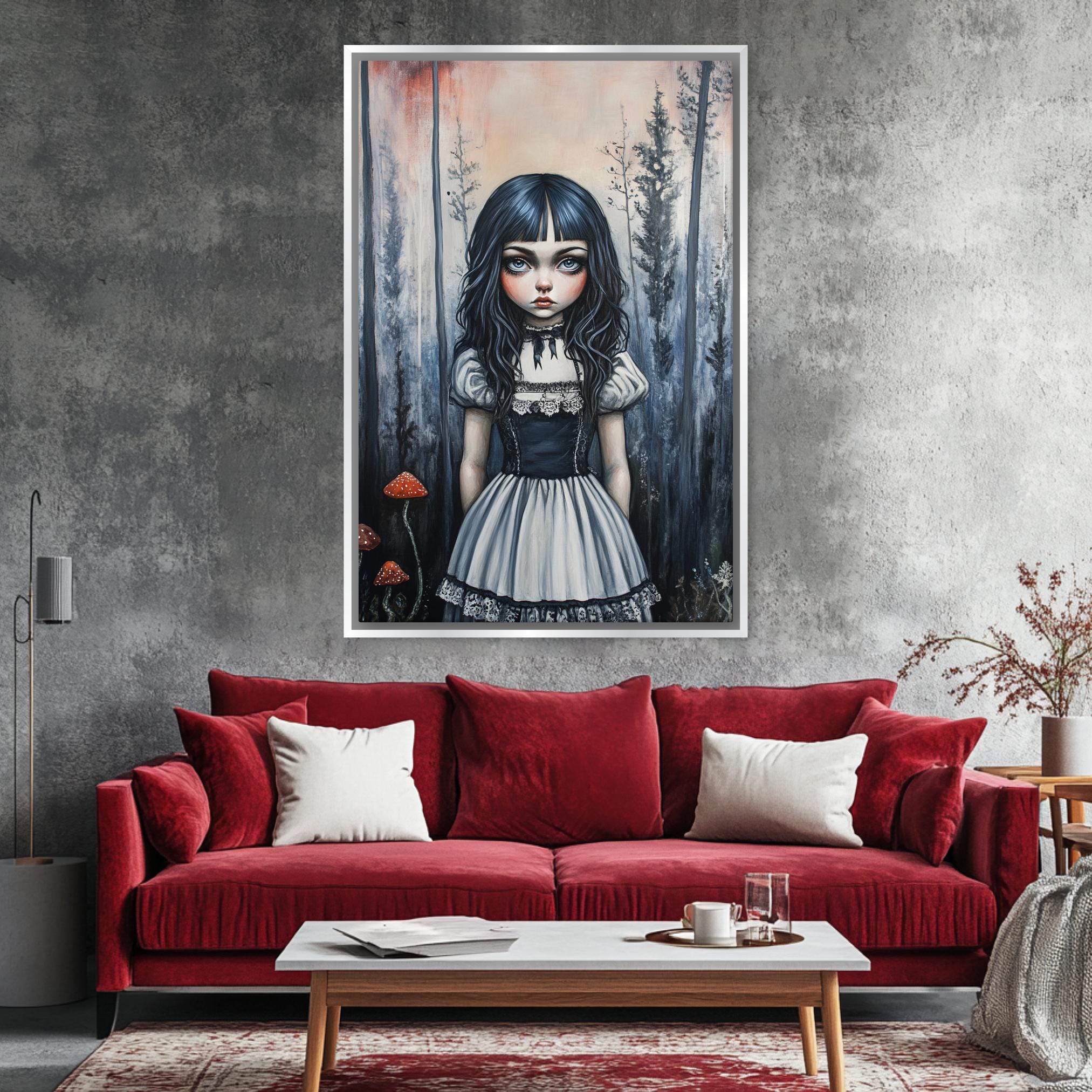 a living room with a red couch and a painting on the wall