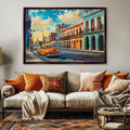 a living room with a couch and a painting on the wall