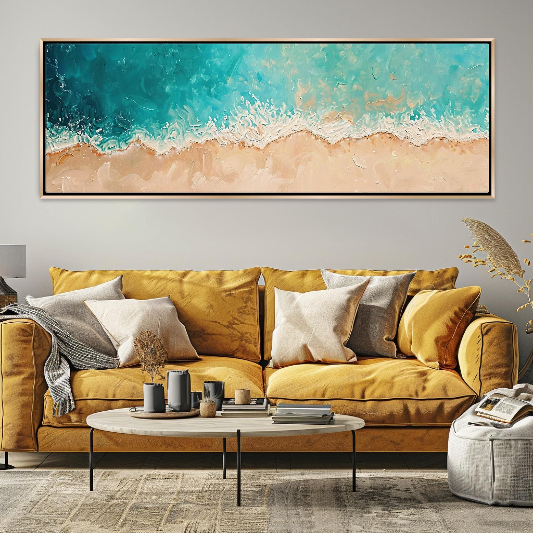 a living room with a couch, coffee table and a painting on the wall