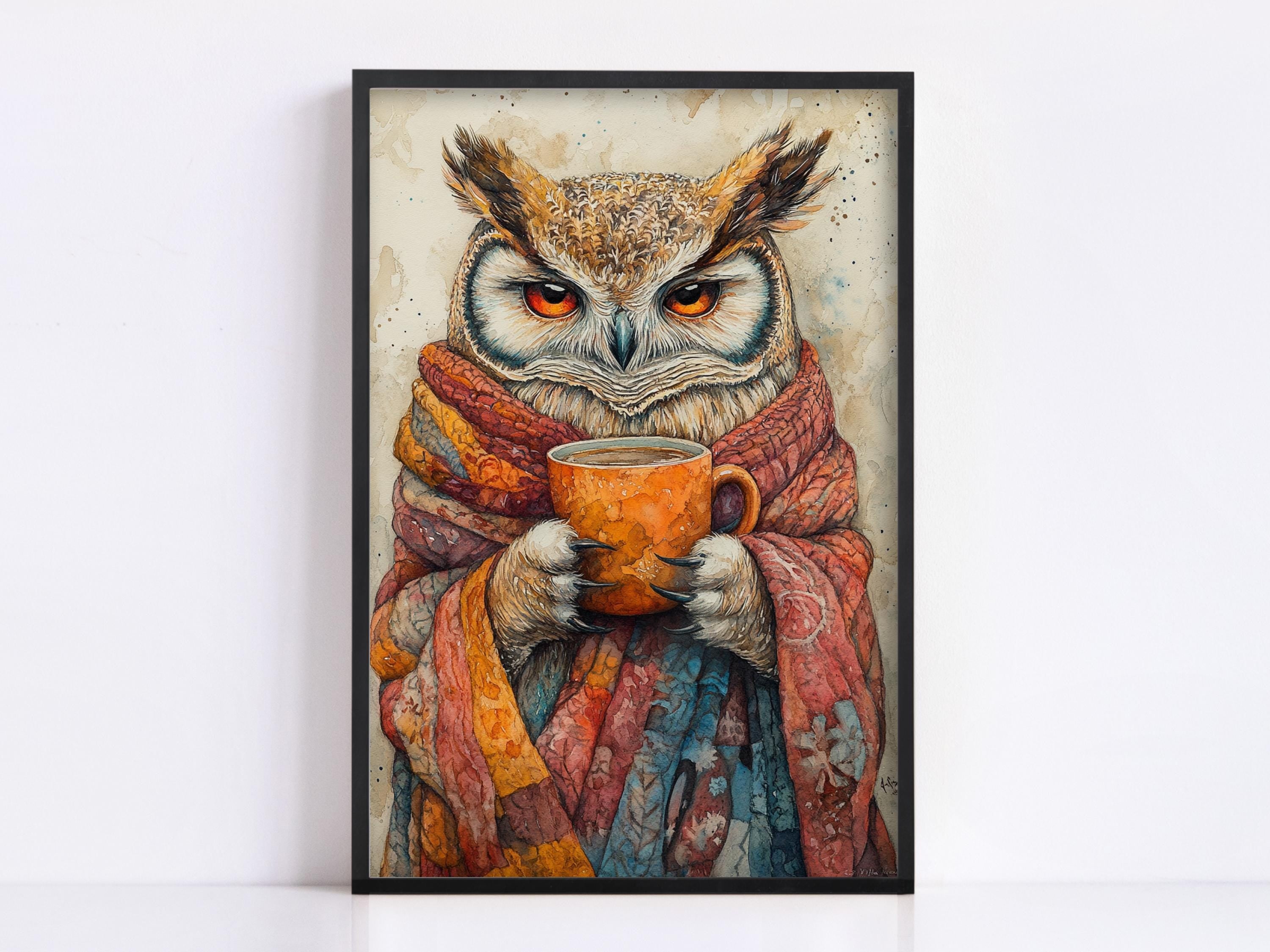 A framed painting depicting an owl wearing a colorful scarf and holding a cup of tea or coffee.