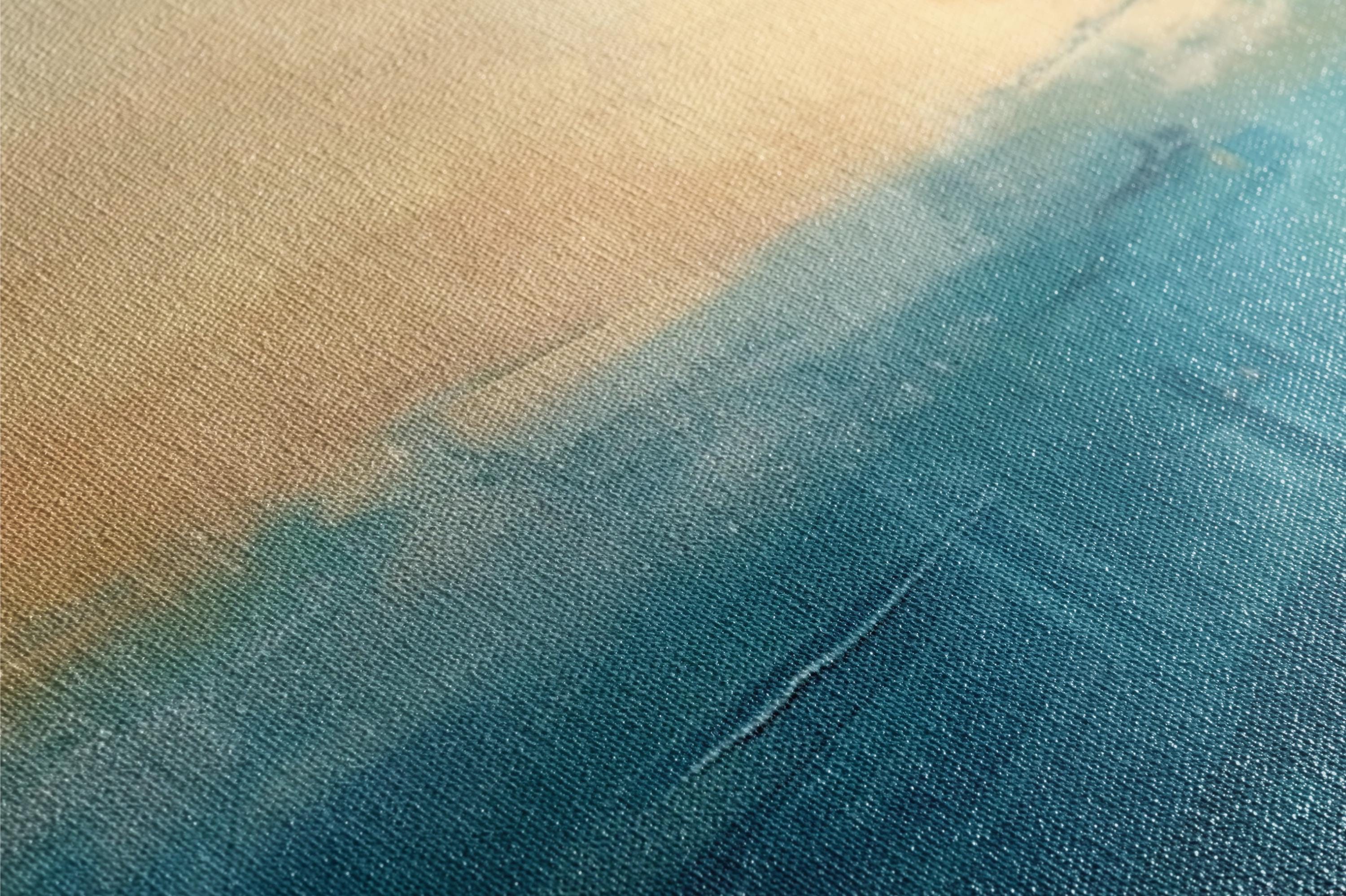 a close up of a piece of blue and yellow fabric