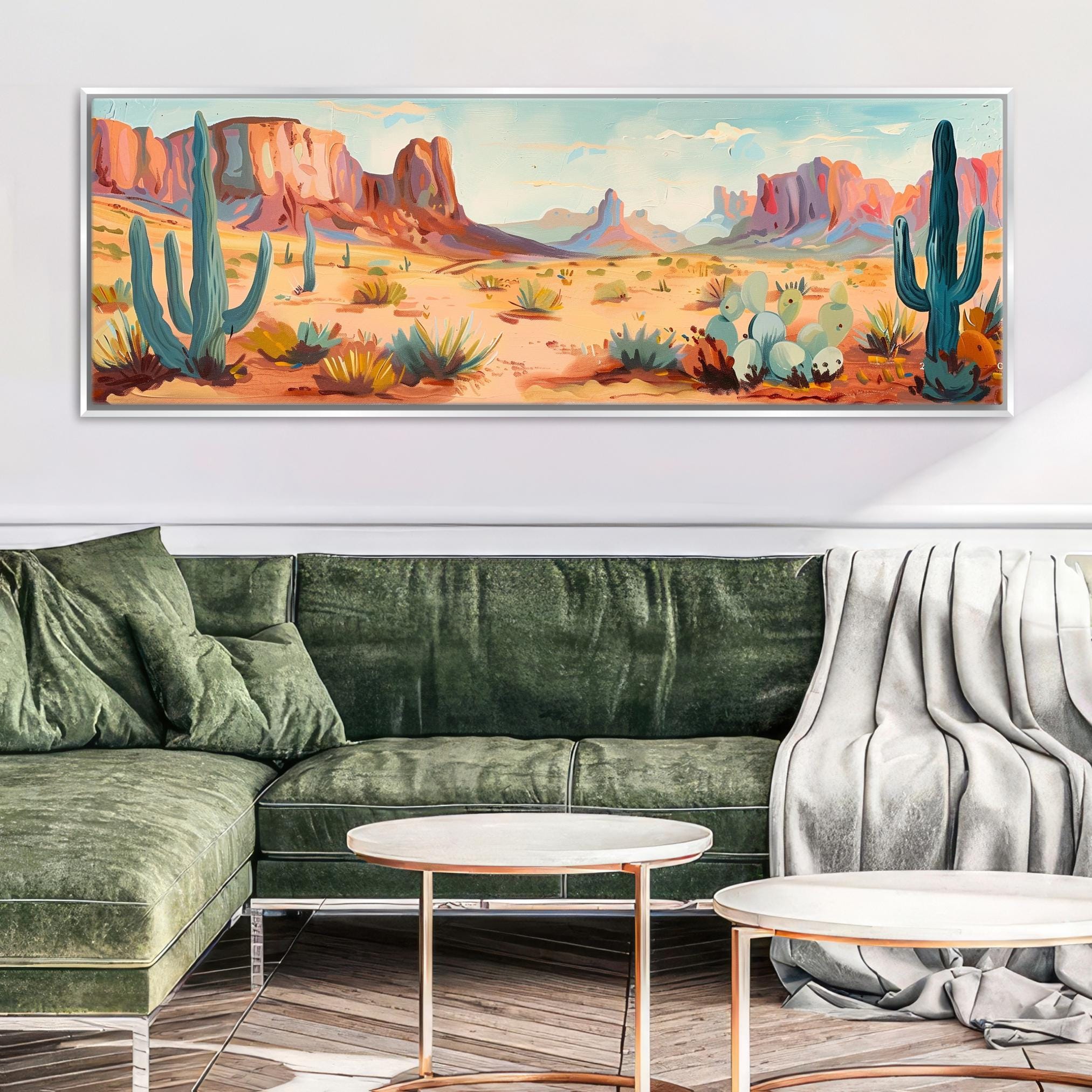 a living room with a green couch and a painting on the wall