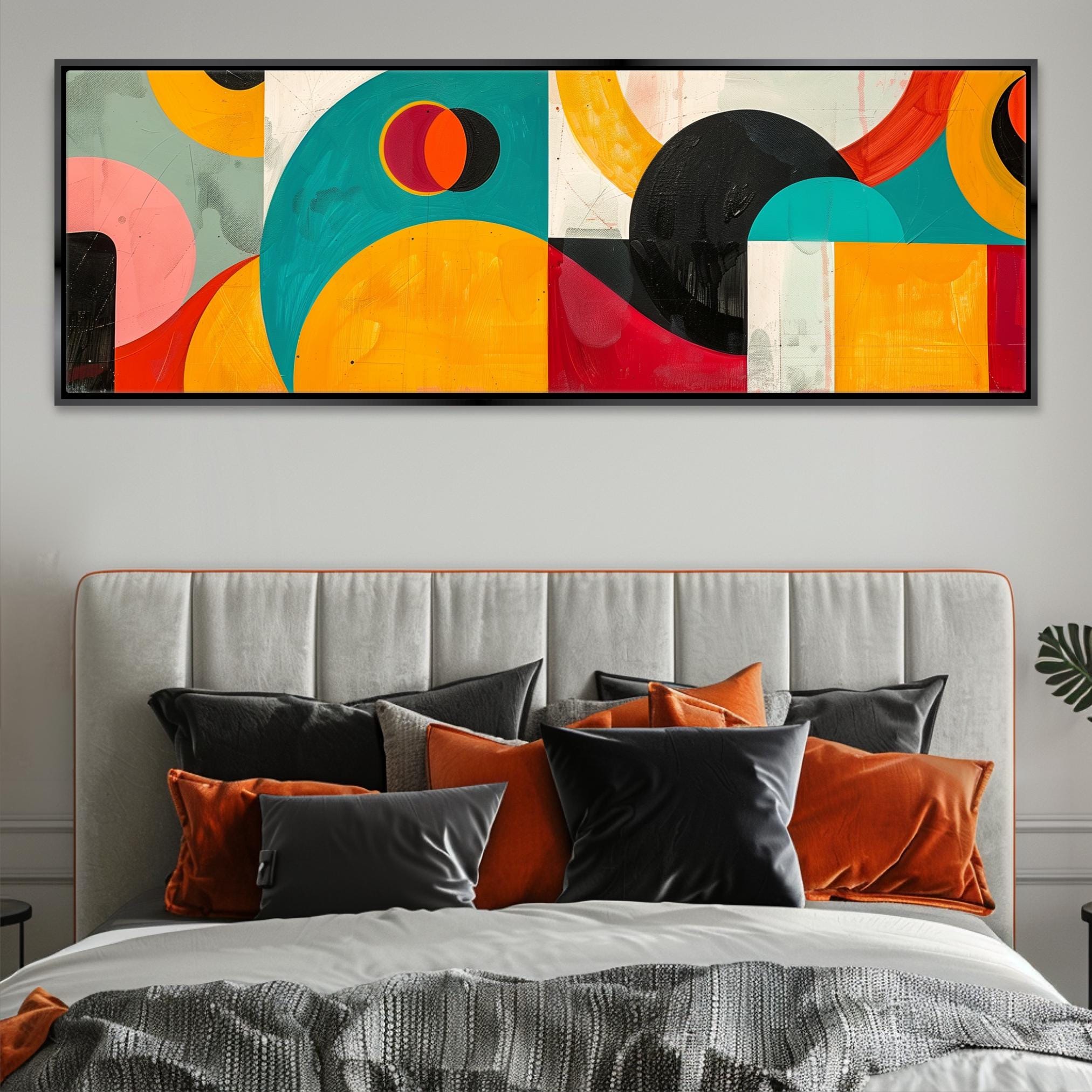 a bedroom with a large painting above the bed