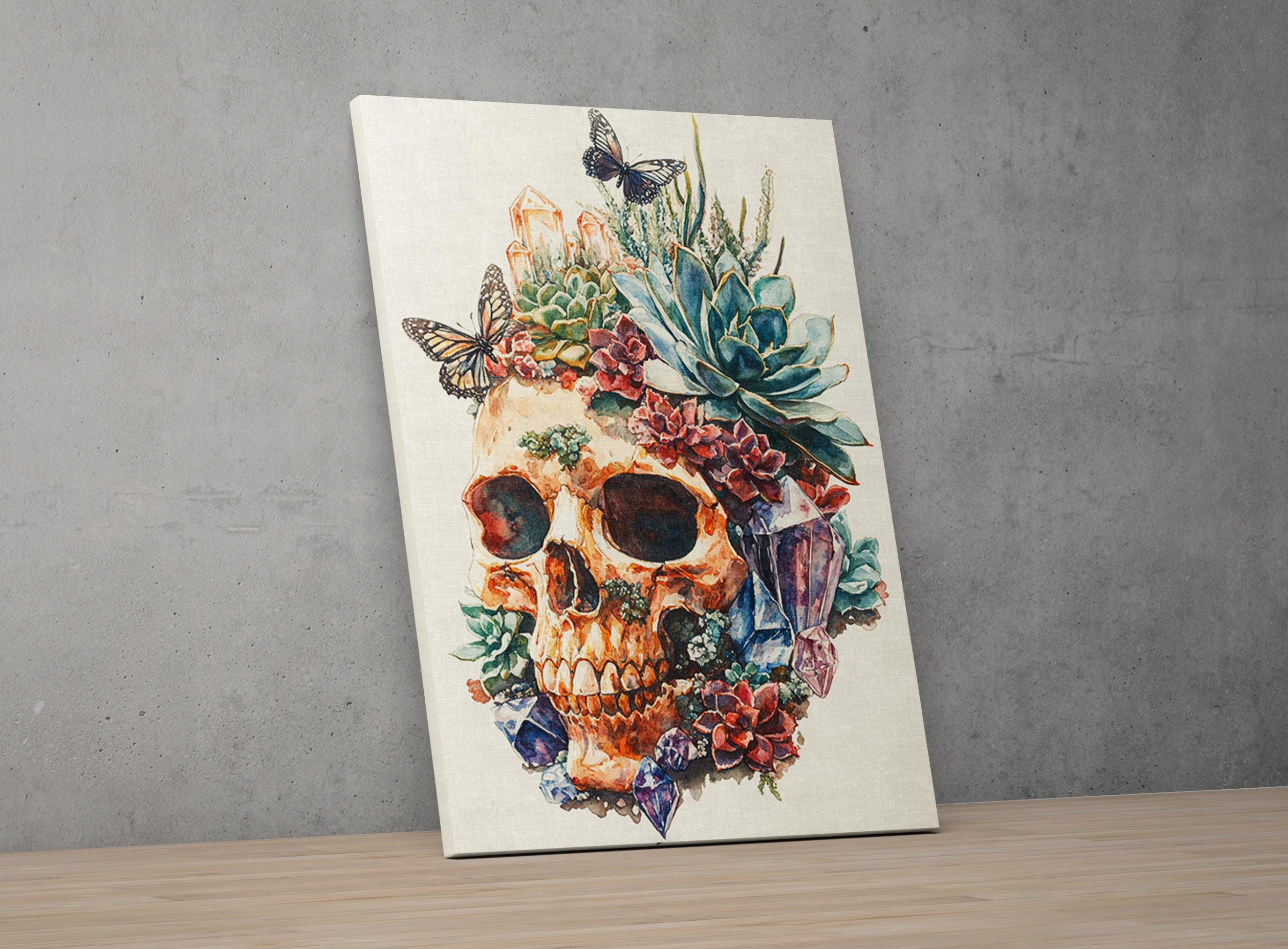 a skull with a floral arrangement on top of it, including a succulent, flowers, and butterflies.