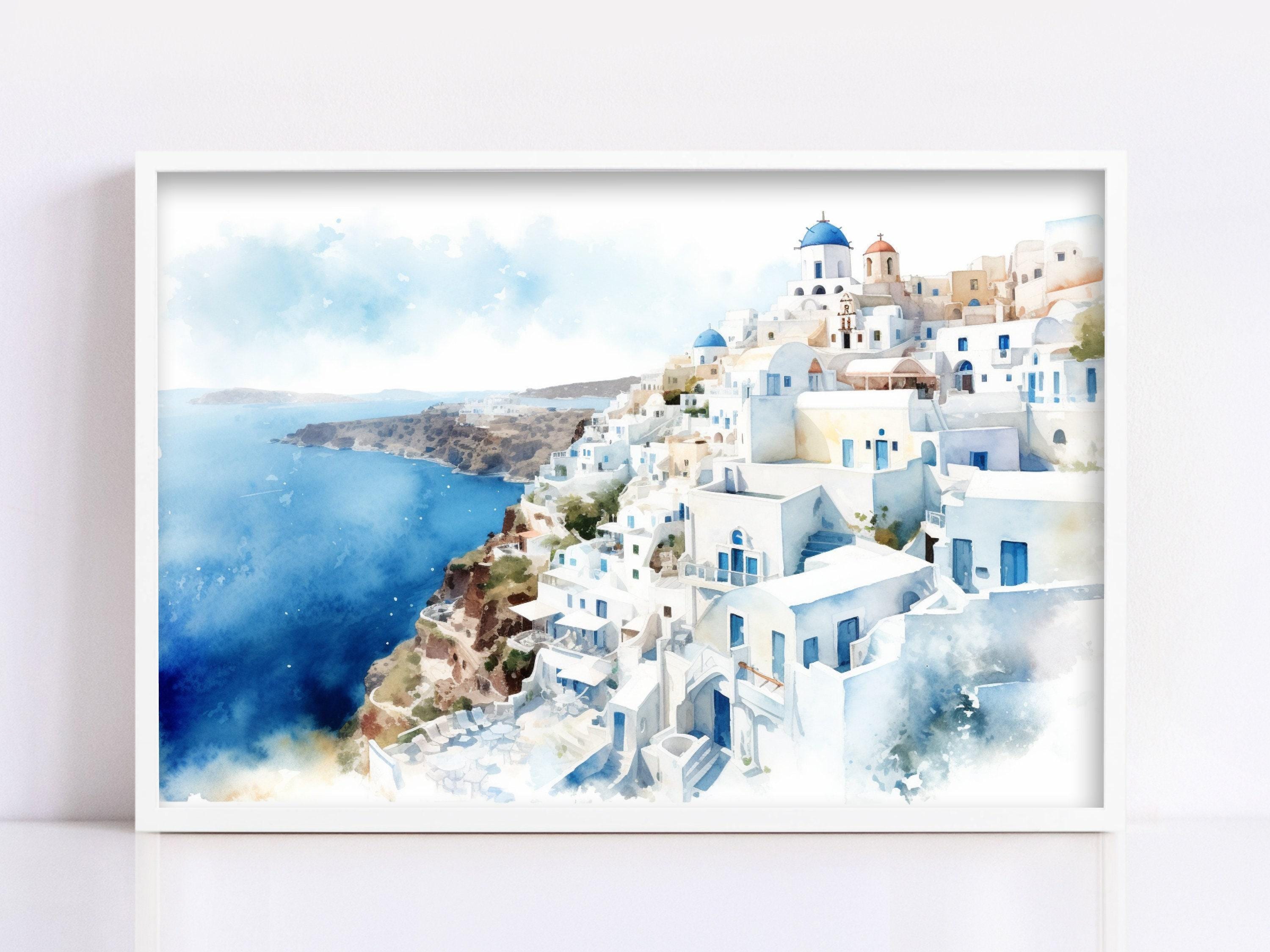 A framed watercolor painting depicting a picturesque coastal town with white buildings and blue roofs, overlooking the ocean.