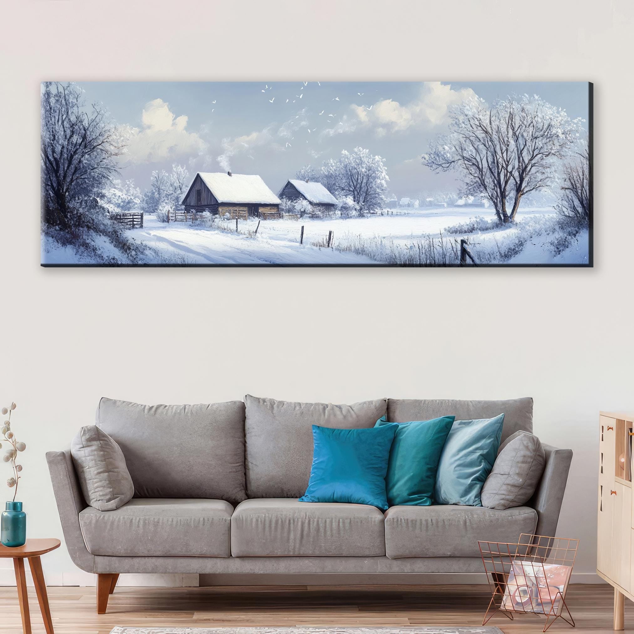 a living room with a couch and a painting on the wall