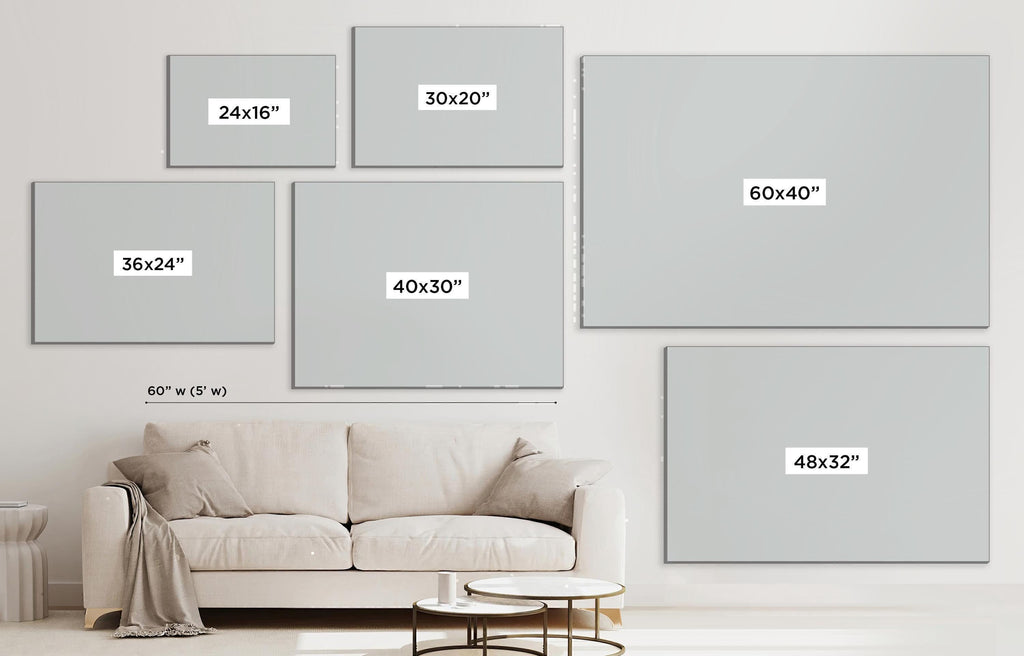 a living room with a white couch and a white wall