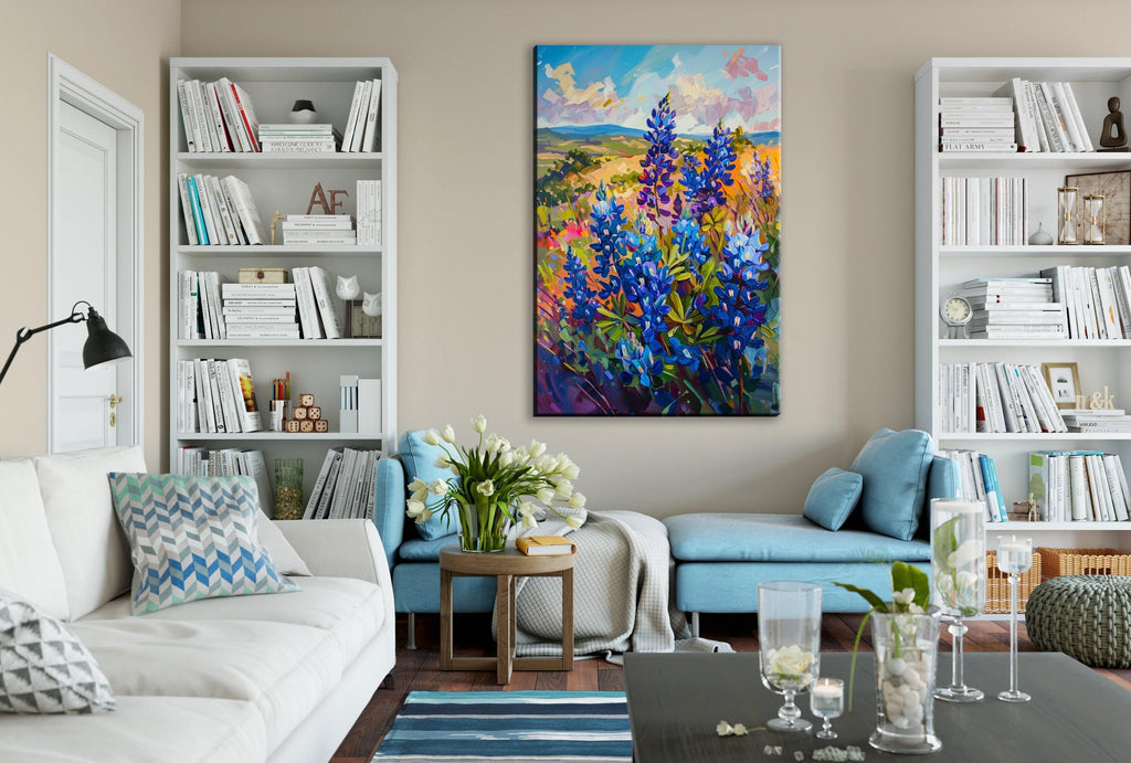 a cozy living room with a large painting of a field of colorful flowers hanging on the wall. The room is furnished with a white sofa, a blue armchair, and a wooden coffee table. The walls are decorated with white bookshelves, and the room is illuminated by a lamp and natural light coming through the window.