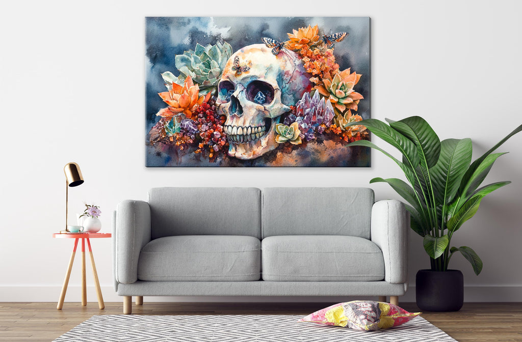 a gray sofa, a potted plant, a lamp, and a large painting of a skull surrounded by colorful flowers and plants on the wall above the sofa.