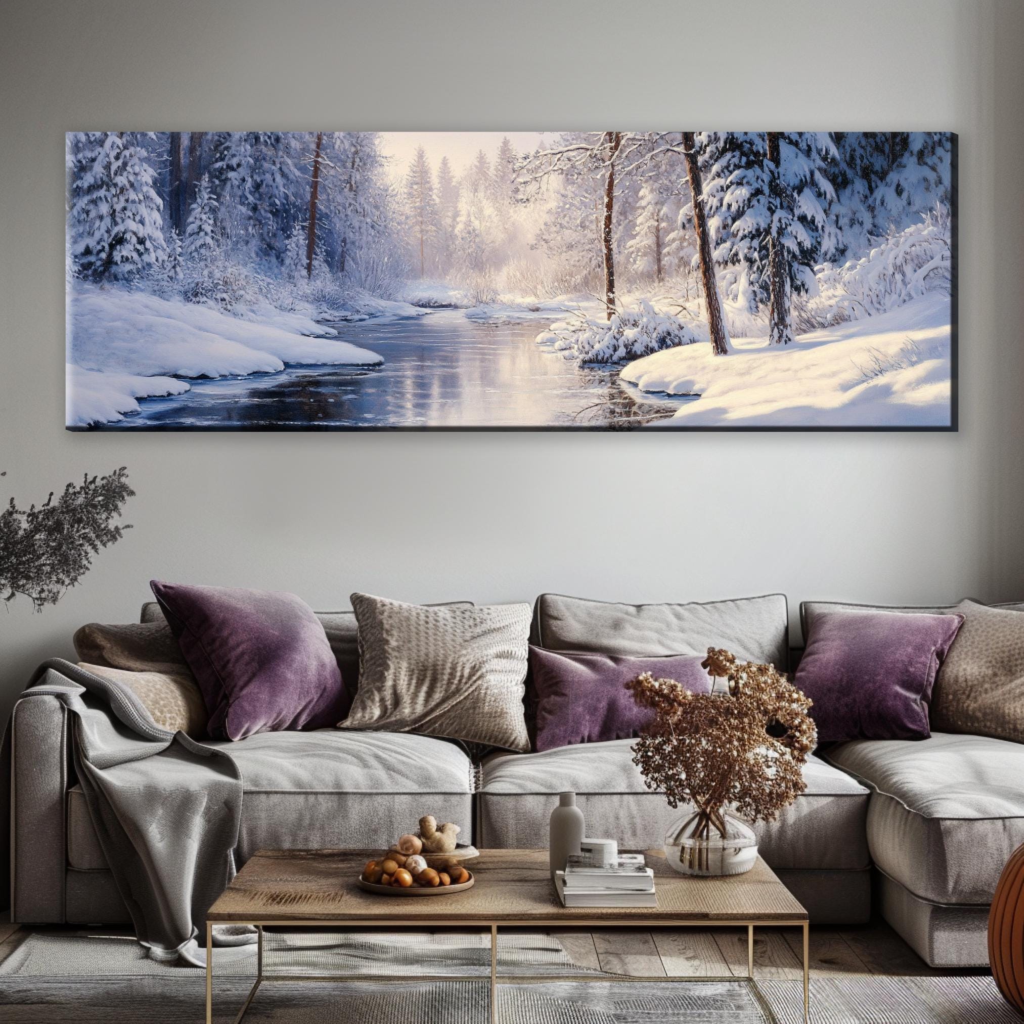 a living room with a couch and a painting on the wall