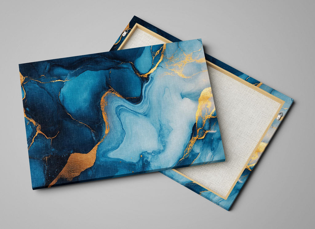 a pair of blue and gold coasters sitting on top of each other