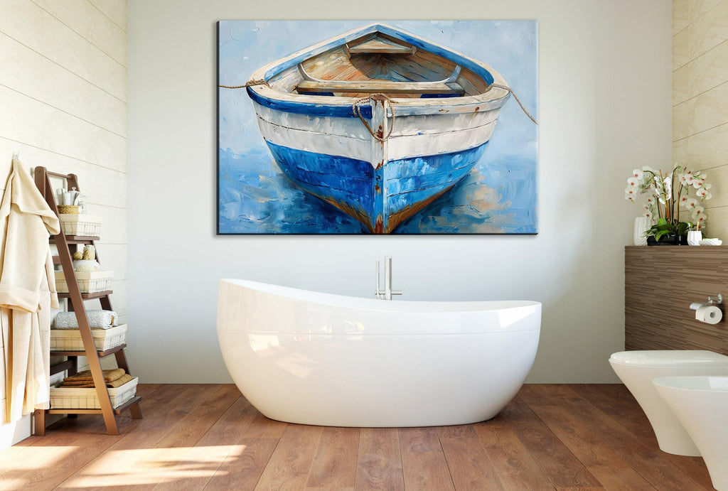 a bathroom with a large painting of a blue and white striped boat hanging on the wall above a white freestanding bathtub.