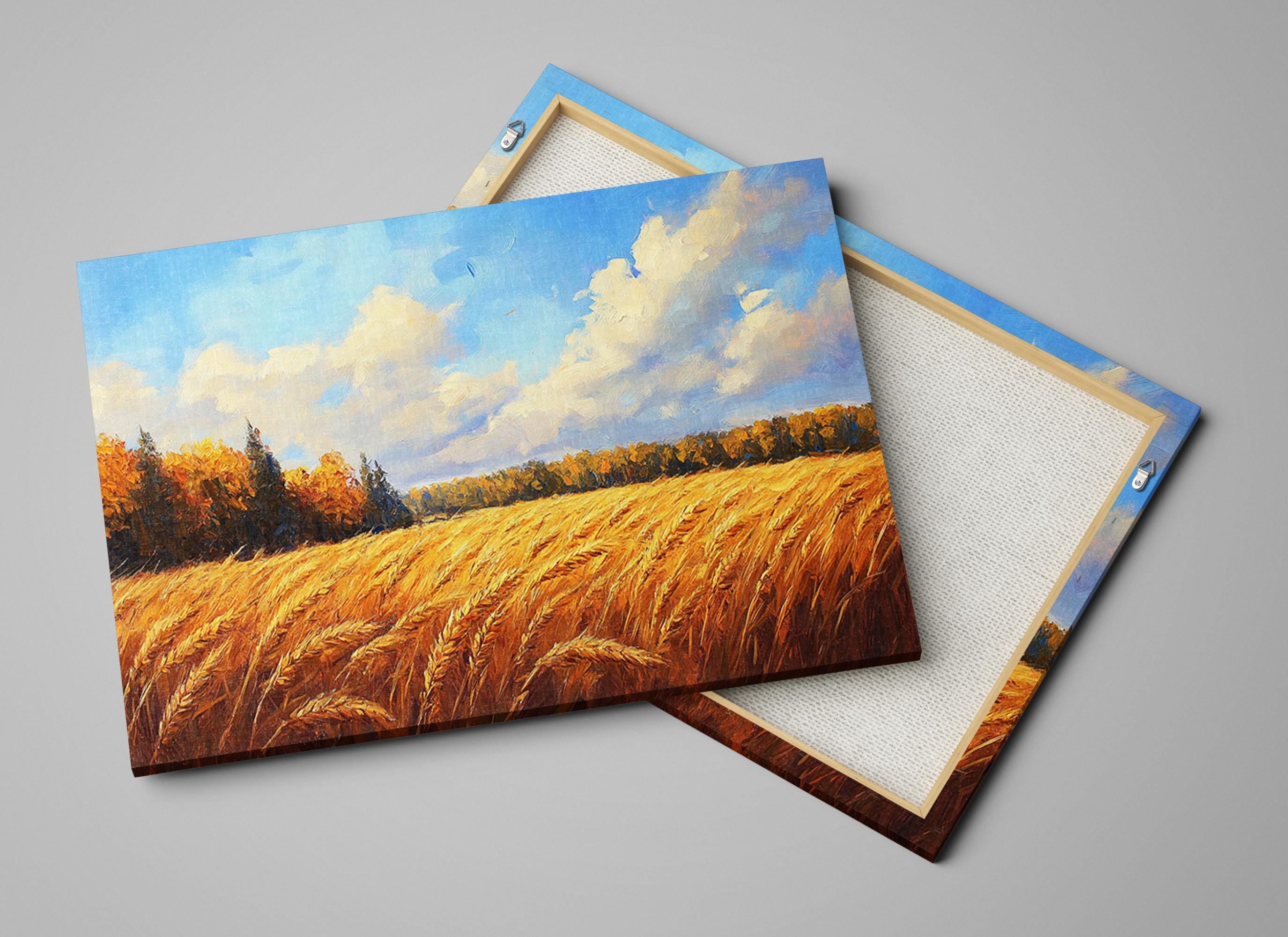 a serene landscape with a field of golden wheat under a blue sky with fluffy white clouds.