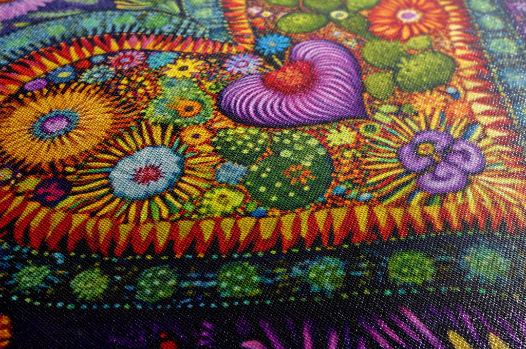 a close up of a colorful painting on a canvas
