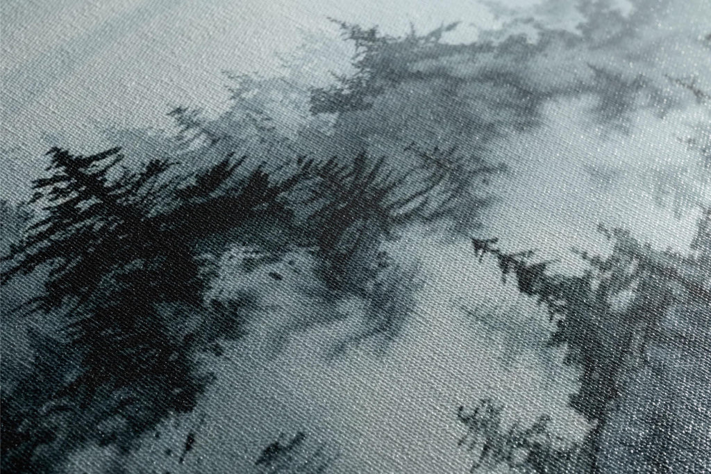 a black and white photo of trees in the snow