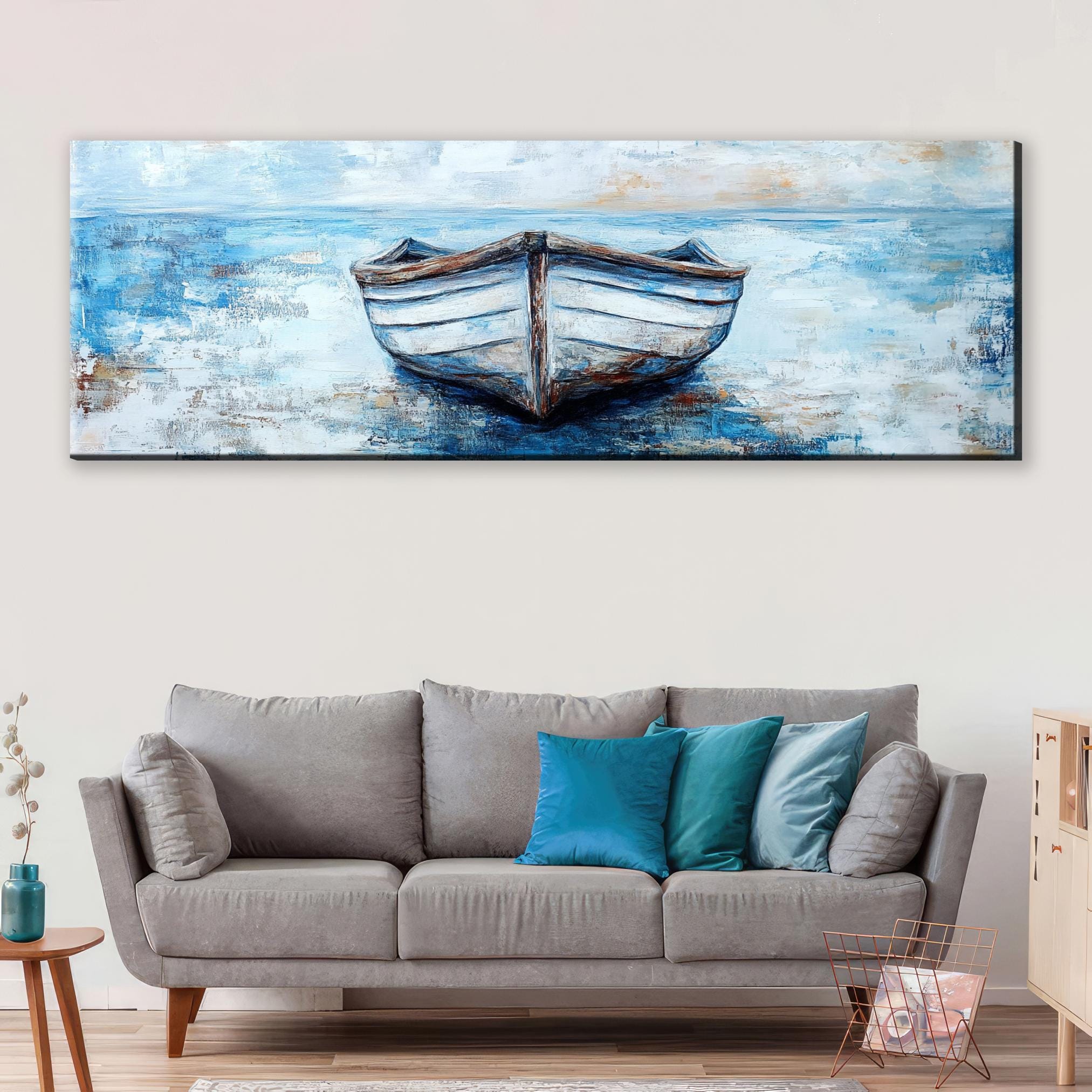 a living room with a couch and a painting on the wall