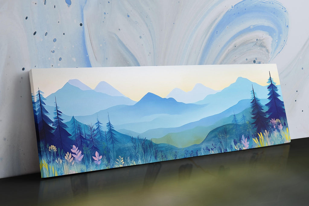 a painting of mountains and trees on a table