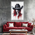 a living room with a red couch and a painting on the wall