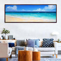 a living room with a couch and a painting on the wall