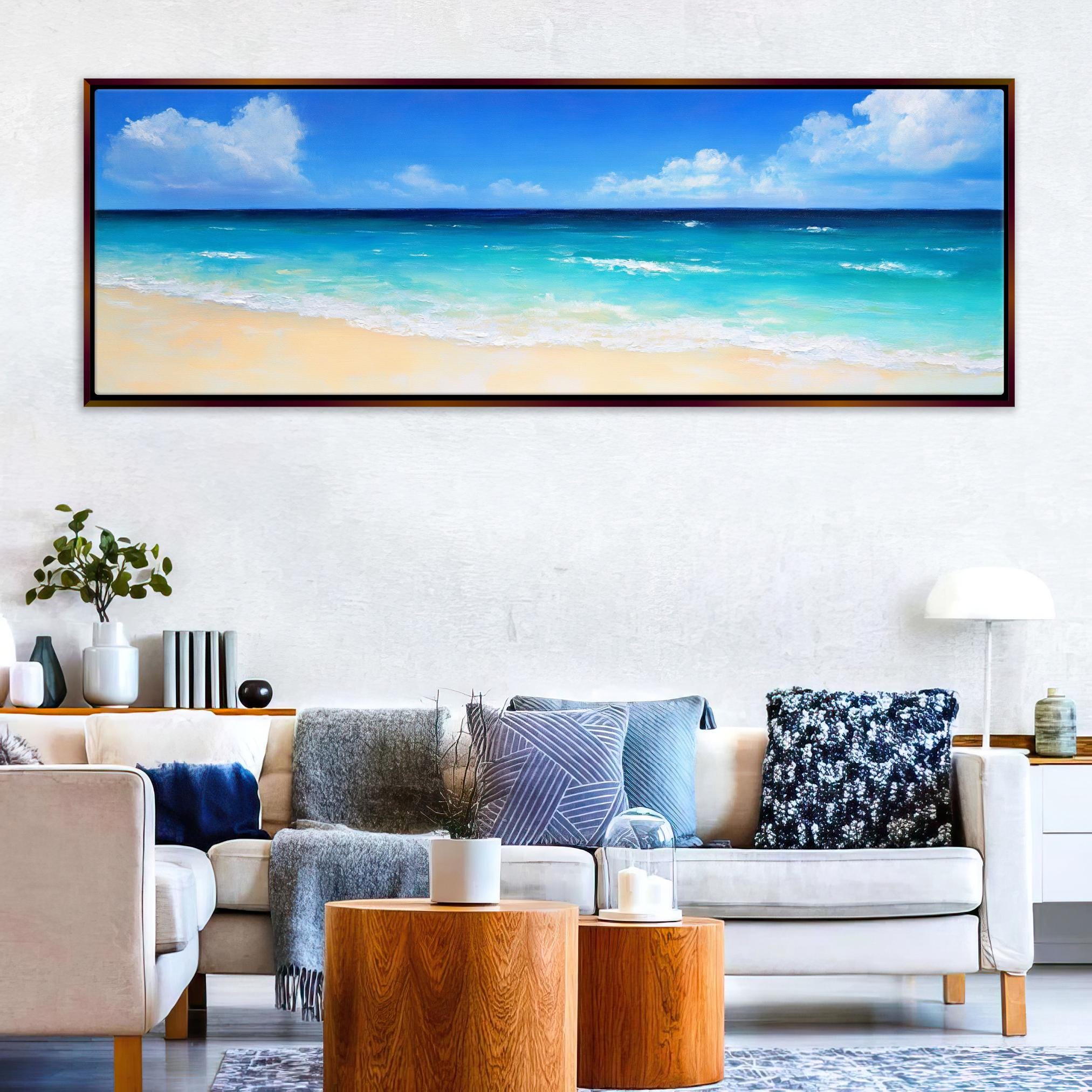 a living room with a couch and a painting on the wall