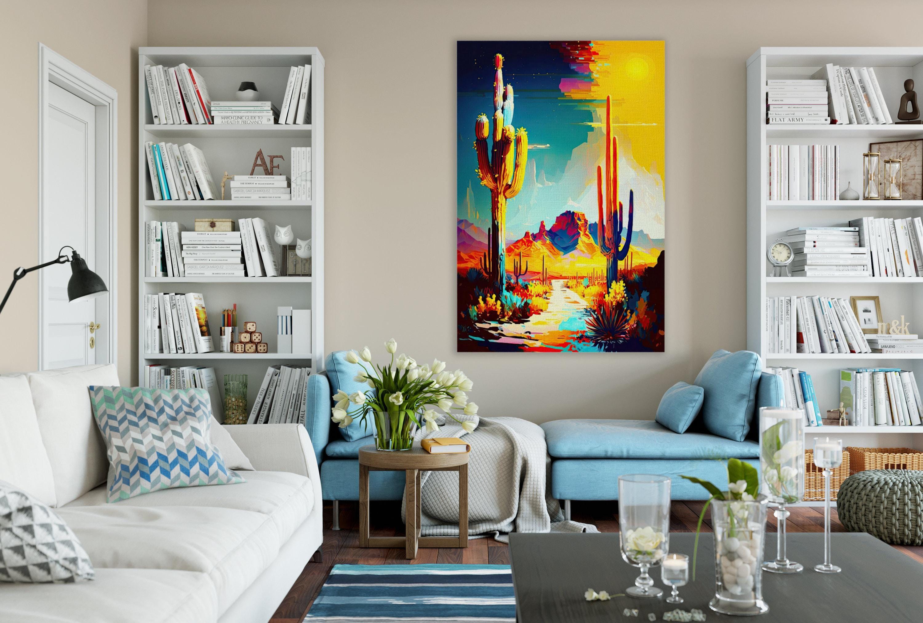 a cozy living room with a large, colorful painting of a desert landscape hanging on the wall. The room is furnished with a white sofa, a blue armchair, and a wooden coffee table. The walls are adorned with numerous bookshelves filled with books, and the room is decorated with vases, candles, and other decorative items.