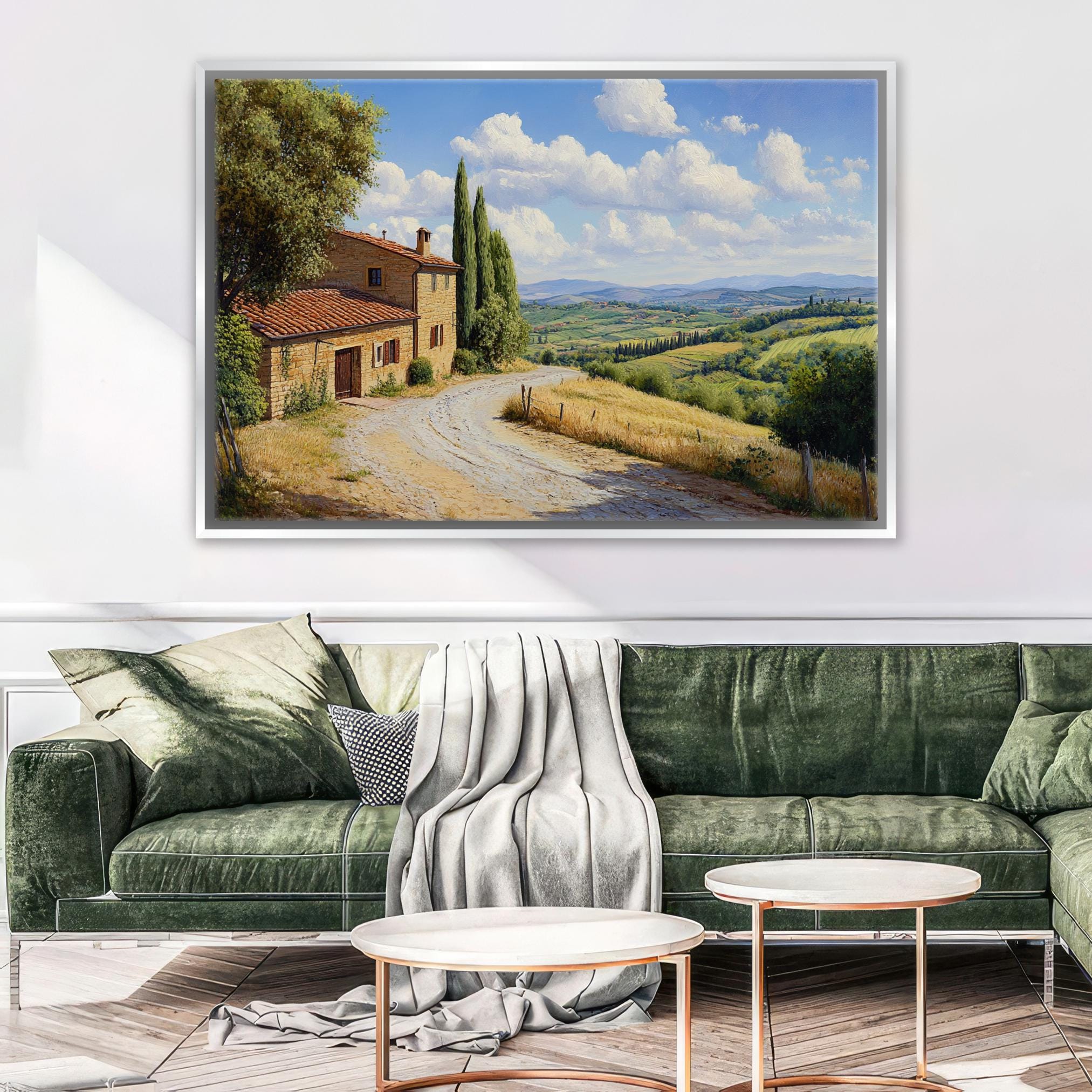 a living room with a green couch and a painting on the wall