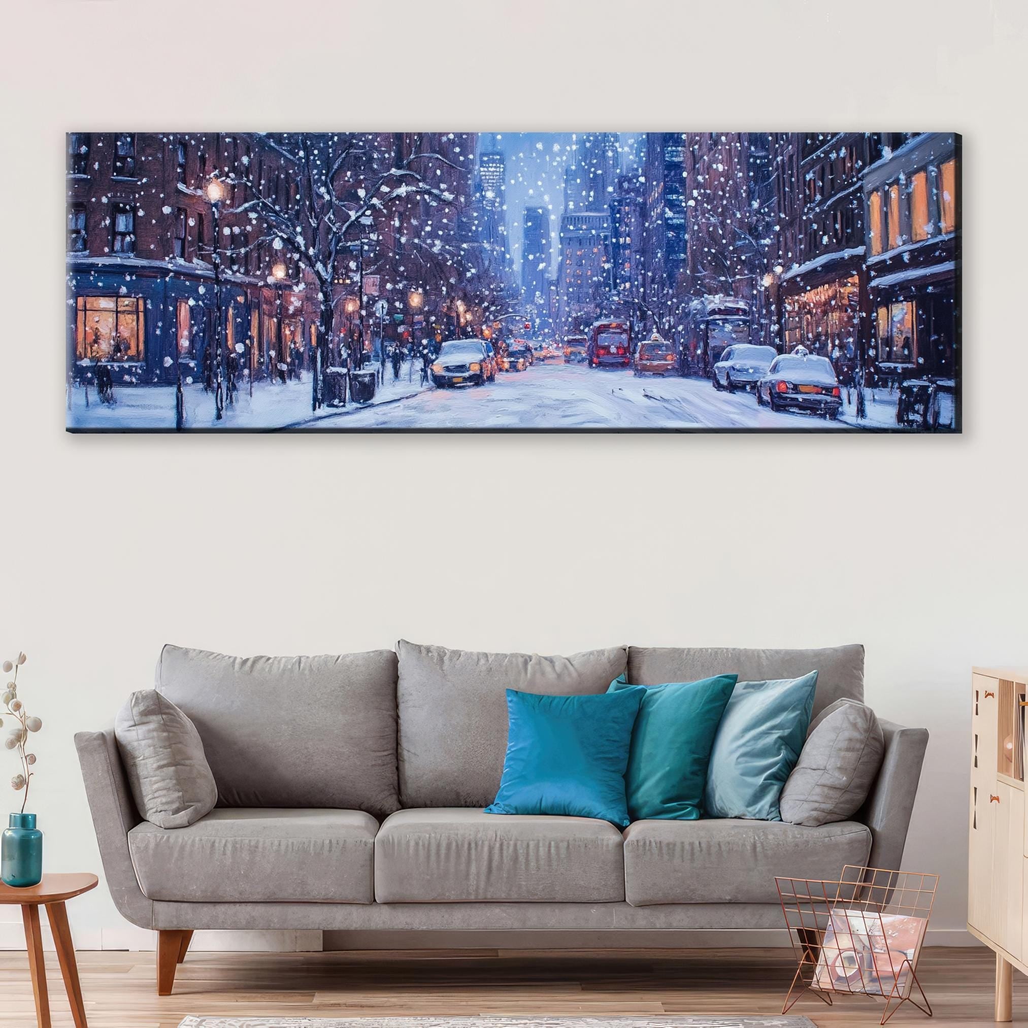 a living room with a couch and a painting on the wall