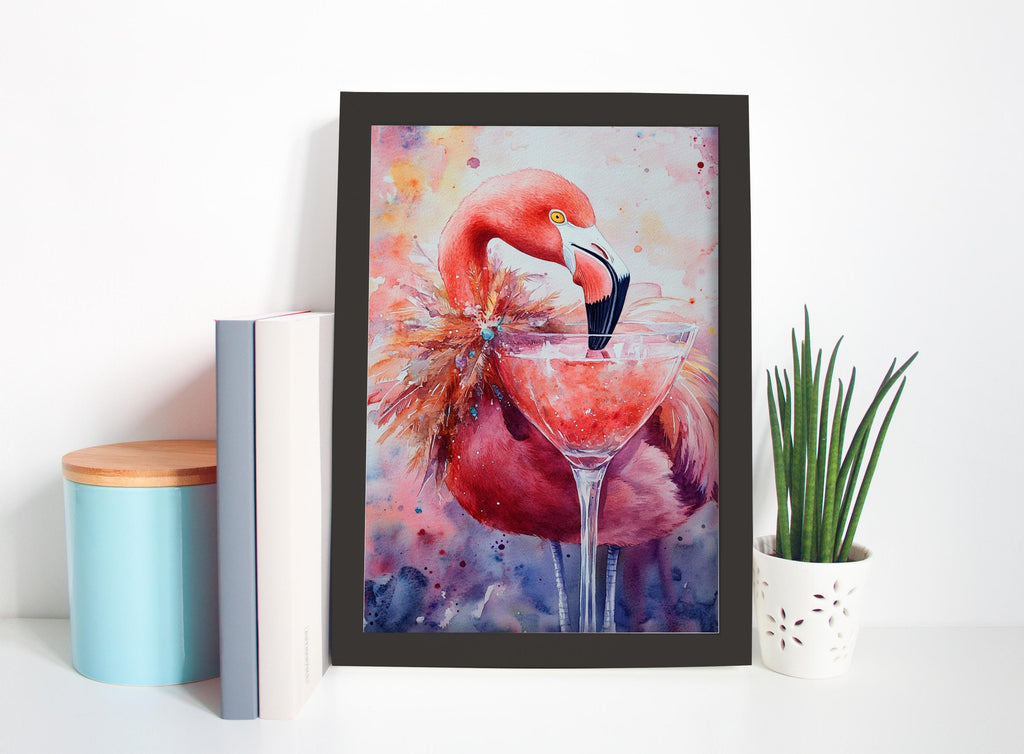 A framed painting of a pink flamingo standing in a martini glass, surrounded by a blue and white color palette.