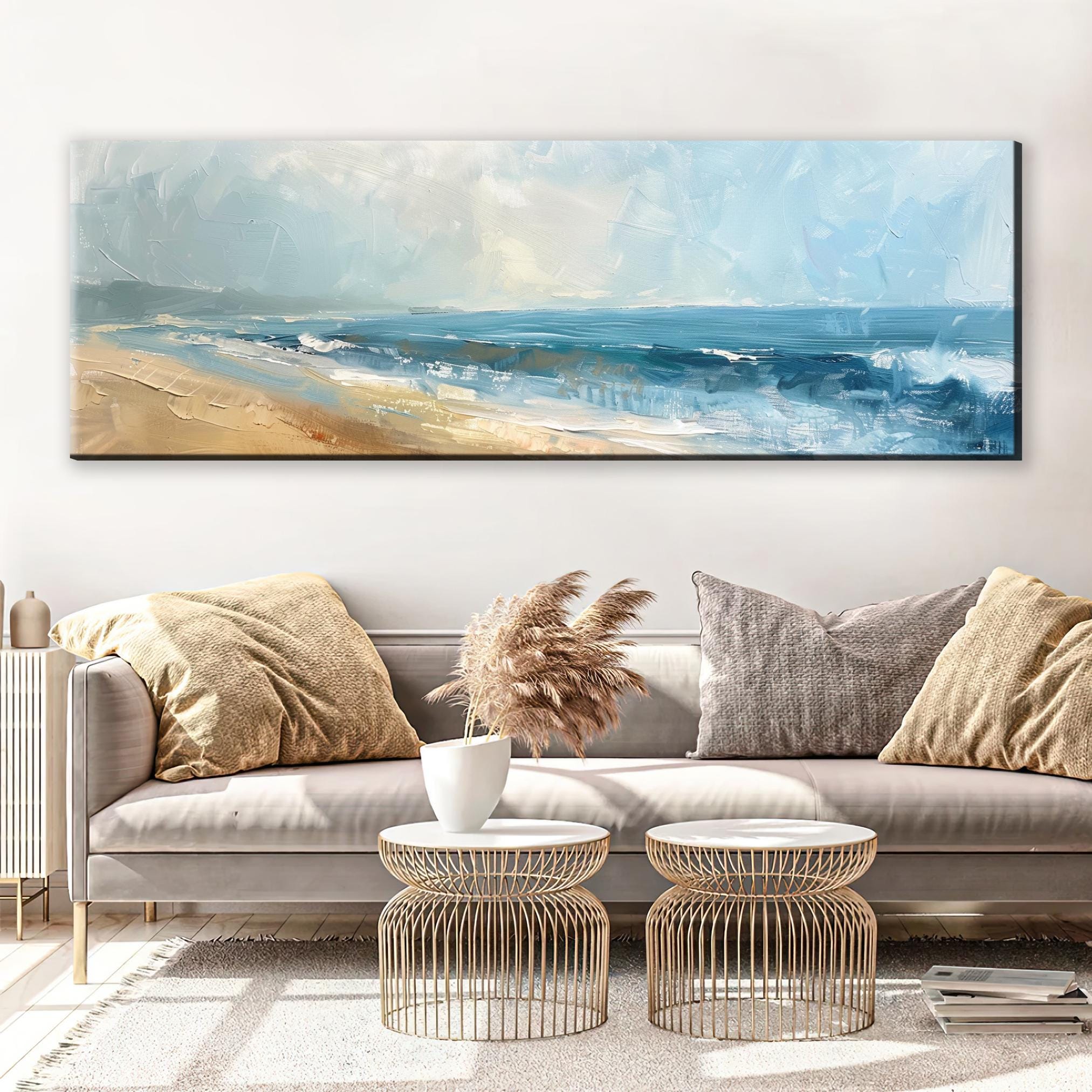 a living room with a couch and a painting on the wall