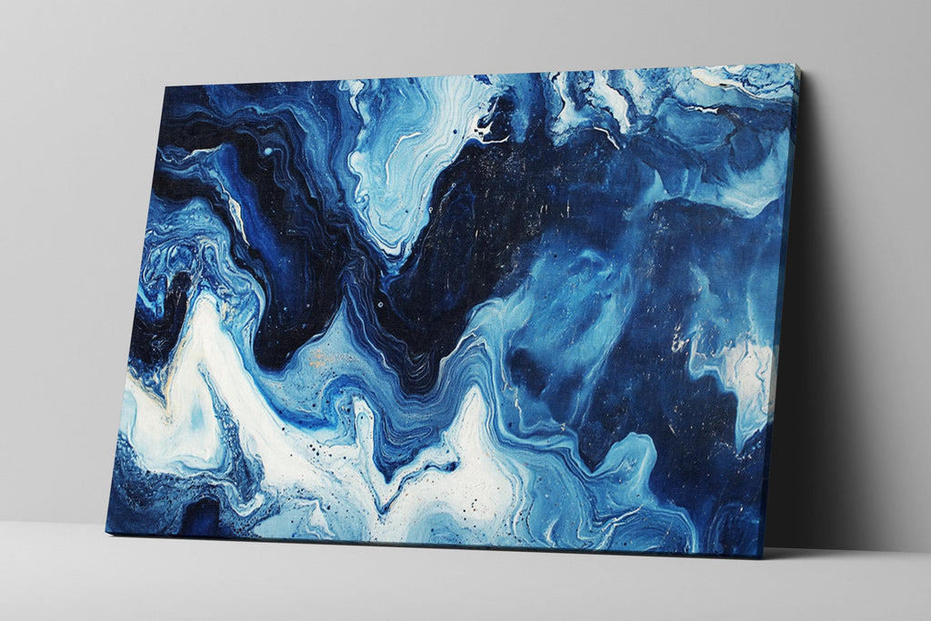 a blue and white painting on a wall