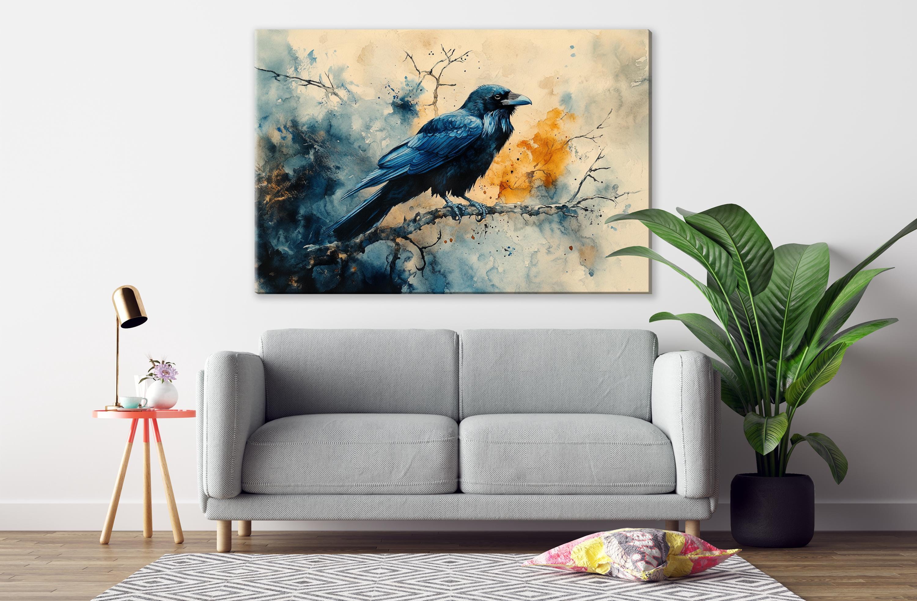 a gray sofa in a living room with a large painting of a blue bird perched on a branch hanging above it.