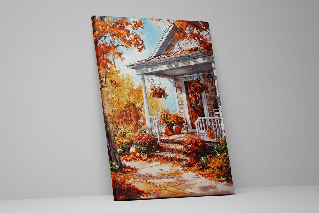 a charming autumn scene with a white house, a porch, and a tree with orange leaves. The house has a red door and a white railing, and the porch is decorated with potted plants and pumpkins. The tree has orange leaves, and the ground is covered in fallen leaves, creating a picturesque autumn landscape.