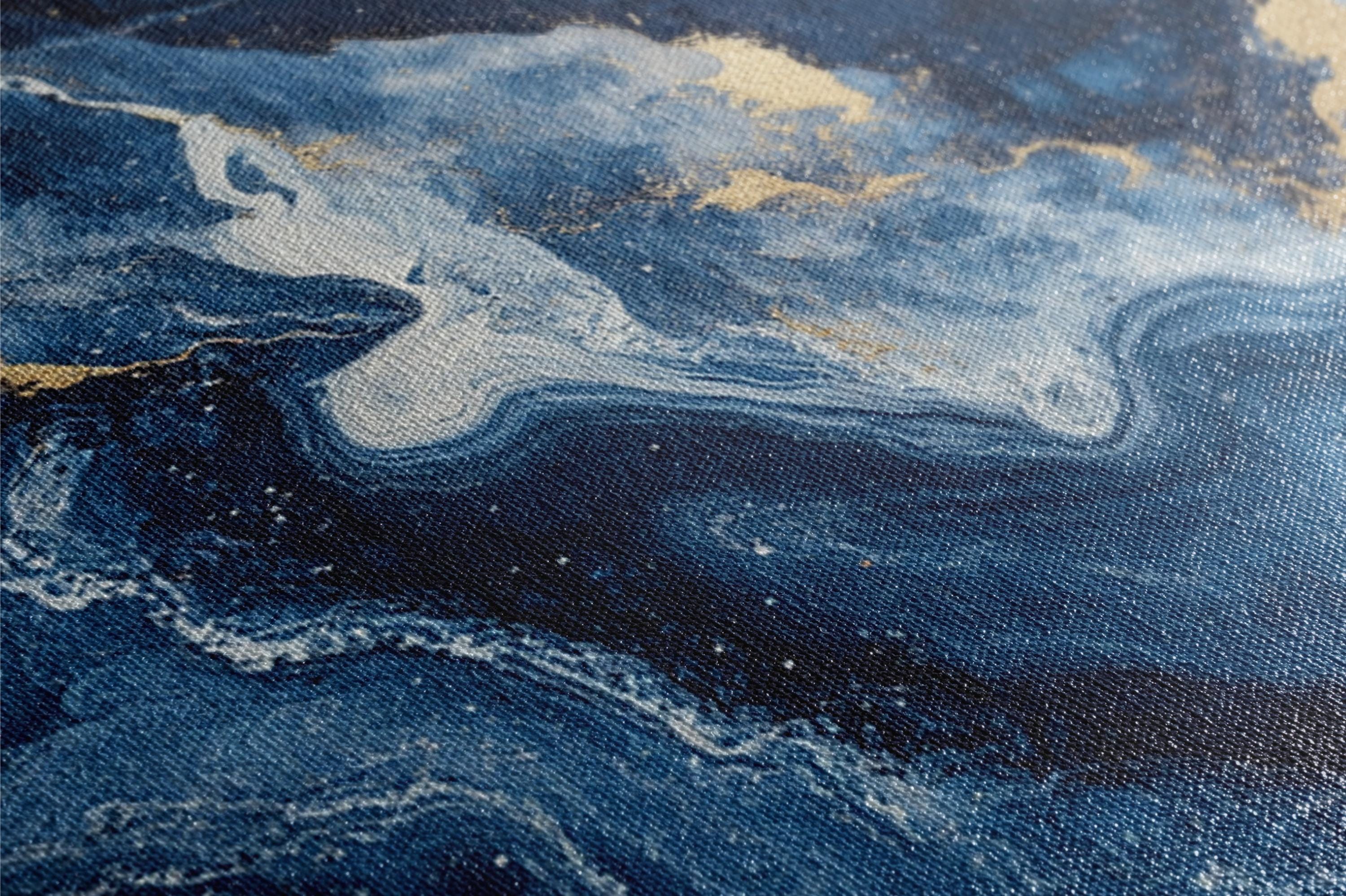 a close up of a piece of art with blue and gold paint