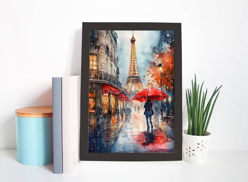 a framed painting of a rainy street scene with the Eiffel Tower in the background, along with a person holding a red umbrella.