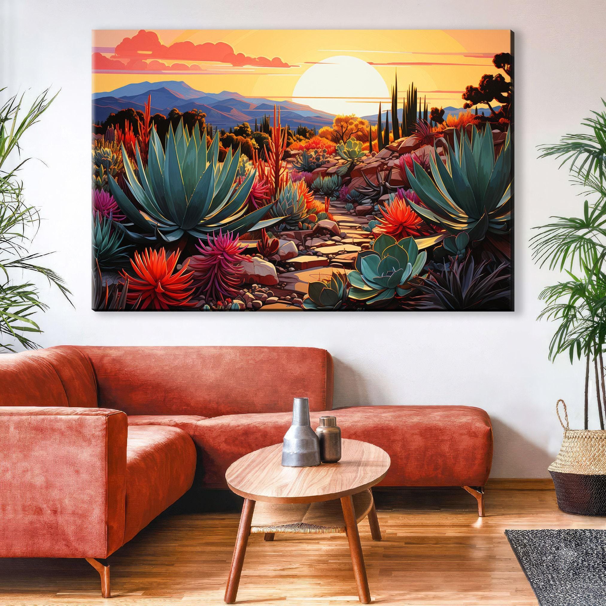 a large, vibrant painting of a desert landscape with a colorful sunset, hanging on a wall above a red sofa and a wooden coffee table in a cozy living room setting.