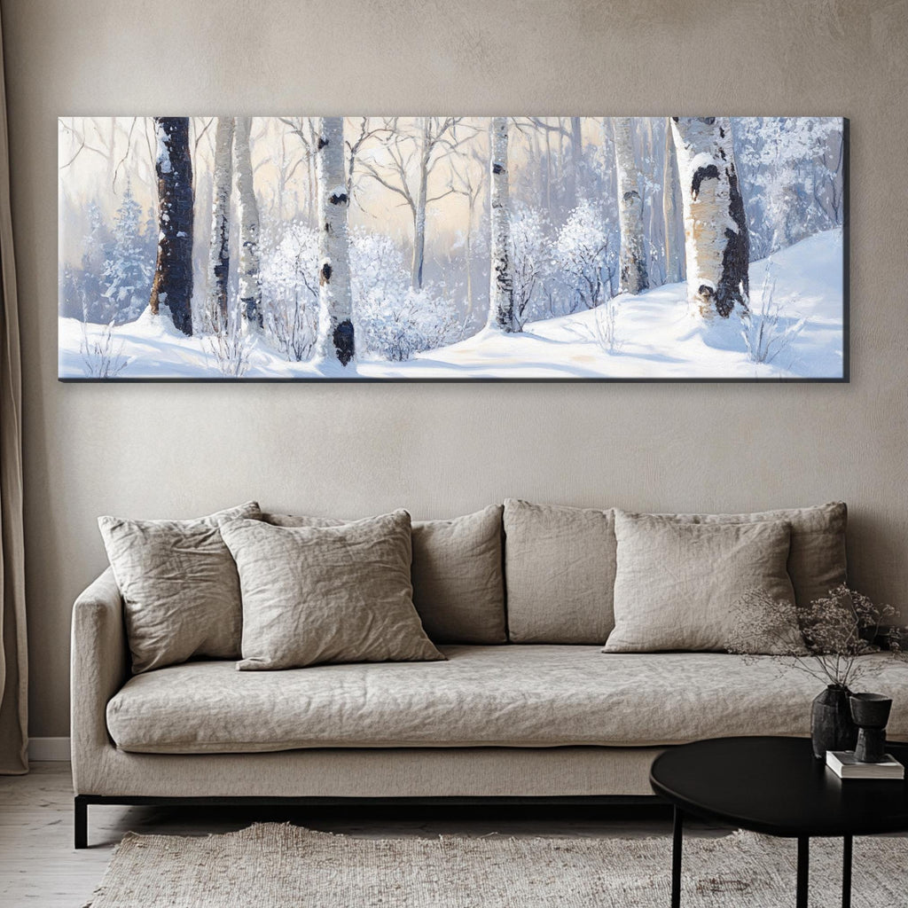 a living room with a couch and a painting on the wall