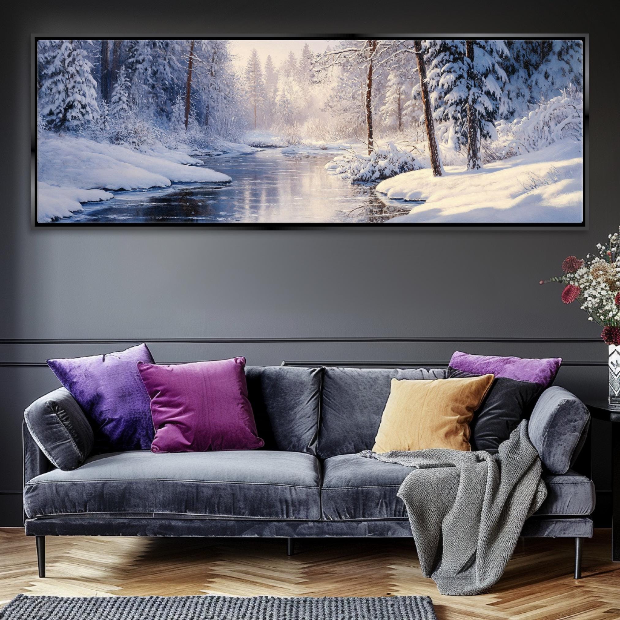 a living room with a couch and a painting on the wall