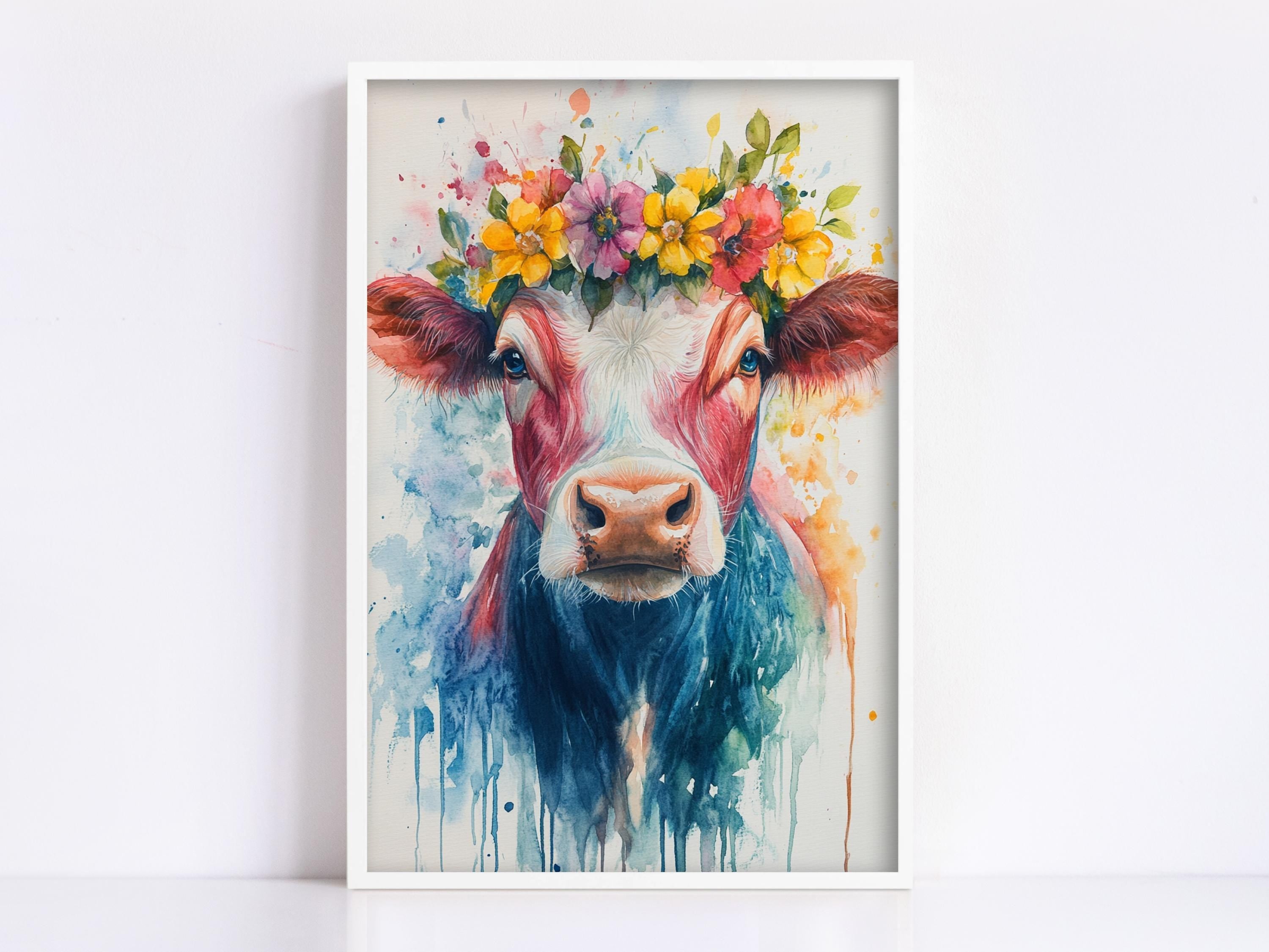 A framed painting depicting a cow with a colorful floral crown on its head.