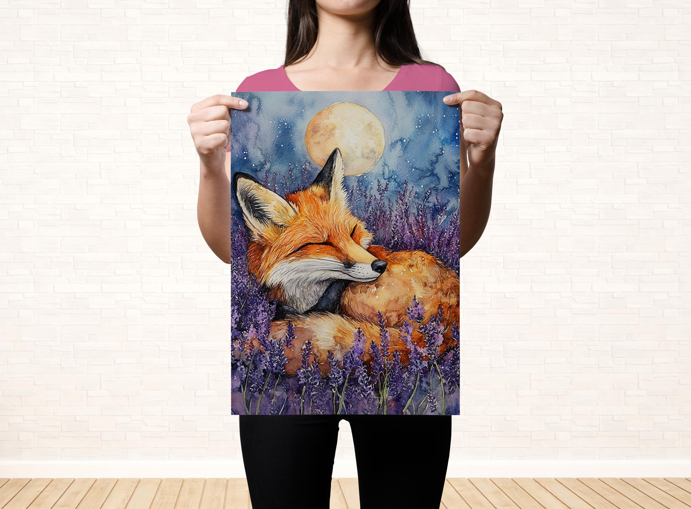 A woman holds up a framed painting of a sleeping fox in a field of purple flowers, with a full moon in the background.
