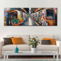 a living room with a couch and a painting on the wall