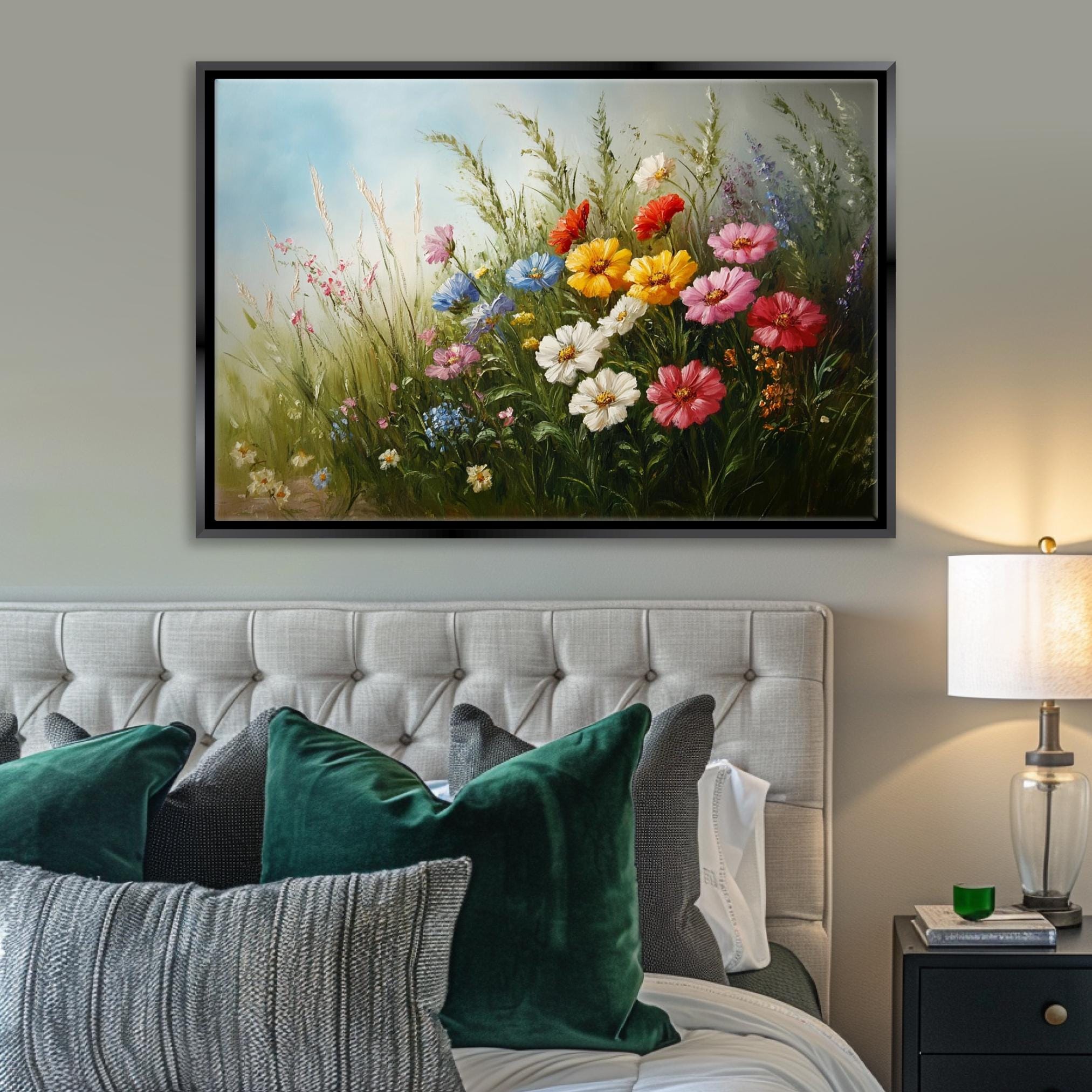 a bedroom with a bed and a painting on the wall