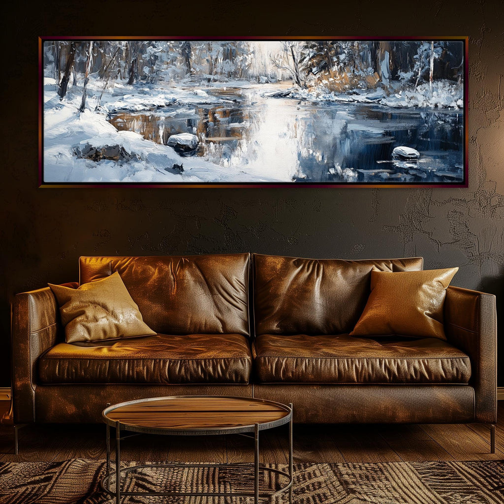 a living room with a couch and a painting on the wall